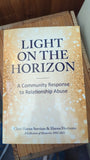 Light On the Horizon: A Community Response to Relationship Abuse by Padraig Haran and Madeline McAleer. Published by Haven Horizons, 2022.